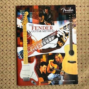 The Fender Guitar Method beginning music book.